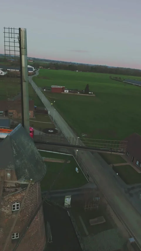 Drone Flying Through Windmill Blades, Historic Windmill in Belgium Video stock 325584880