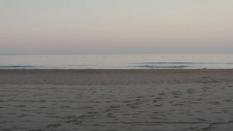 Drone flying thrugh sun beds on sandy beach Stock Footage 119437183