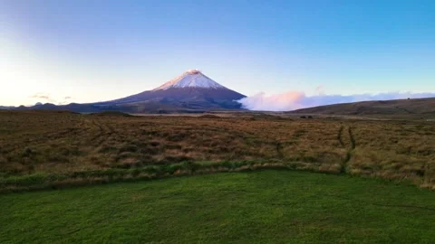 Drone Flying Toward Cotopaxi Volcano Under Clear Blue Sky Stock Footage 343419044