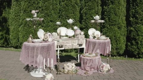 Drone flying toward elegant tableware display Stock Footage 329540350