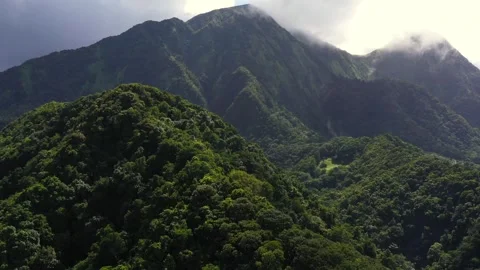 Drone Flying Toward Pitons du Carbet with Dark Clouds and Stormy Atmosphere Stock Footage 317106170