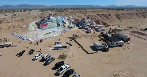 Drone flying toward Salvation Mt. at Slab City, California Video stock 73523562