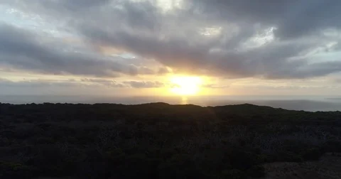 Drone flying toward sunset and ocean 스톡 동영상 84270849