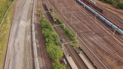 Drone Flying Toward Train Across Railway Network Stock-Footage 334646693