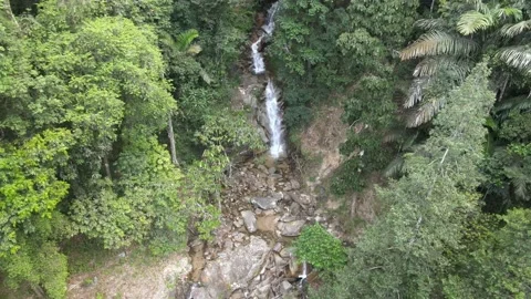 Drone flying towards beautiful waterfall in Negeri Sembilan Stock Footage 149717085