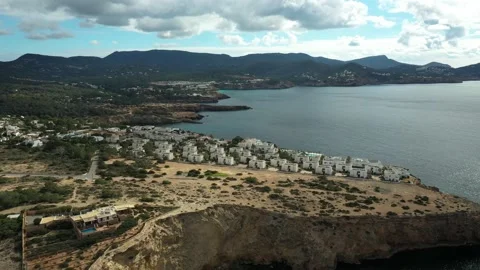 Drone flying towards Cala Codolar beach, in Sant Josep de sa Talaia, Ibiza. Stock Footage 169042775