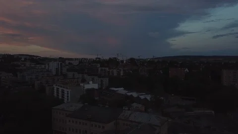 Drone flying towards cranes in a city. Stock Footage