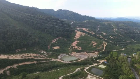 Drone flying towards Fish Pond, Farm and Hills in Kuala Klawang Stock Footage 149717780