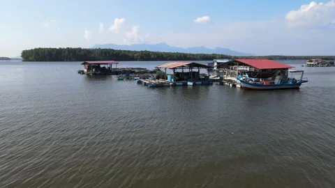 Drone flying towards floating house and river in Sungai Petani, Kedah. Stock Footage 152597610