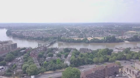 Drone flying towards Hammersmith Bridge London Stock Footage 135824371