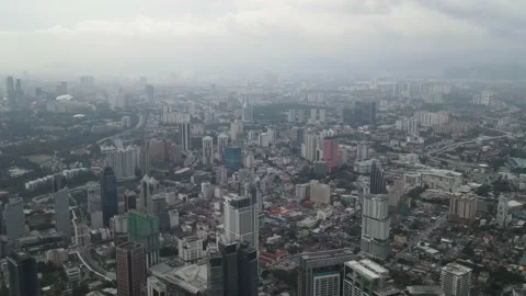 Drone flying towards iconic tower in Kuala Lumpur Stock Footage 150289837