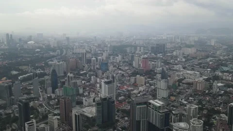 Drone flying towards iconic tower in Kuala Lumpur Stock Footage 150289839
