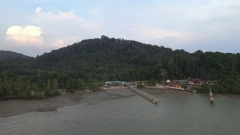 Drone flying towards jetty in Teluk Kemang Stock Footage 150722089