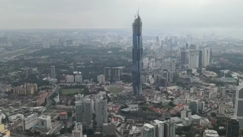 Drone flying towards megatall skyscraper in the World in Kuala Lumpur. Stock Footage 150290416