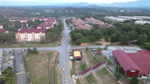 Drone flying towards mosque and housing area in Pajam Stock Footage 149280631
