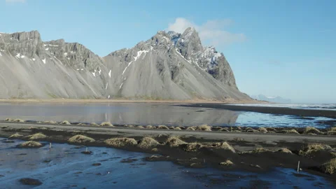 Drone flying towards mountain on coast in Iceland 스톡 동영상 229874266