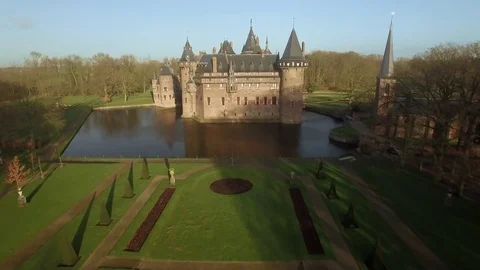 Drone flying towards the old Castle De Haar in the Netherlands Stock Footage 84016376