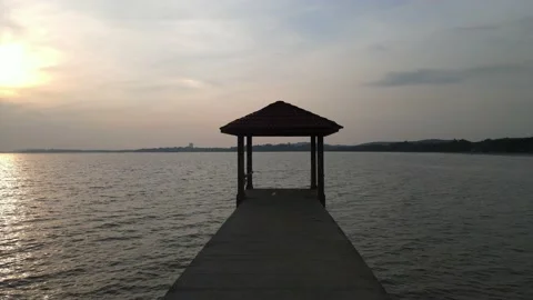 Drone flying towards rest area on the jetty in Pasir Panjang Stock Footage 150722755