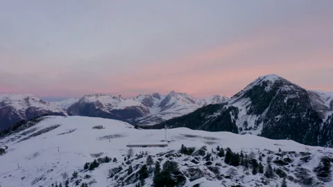 Drone flying towards the sunrise in the middle of the mountain in the french Stock Footage 145699860