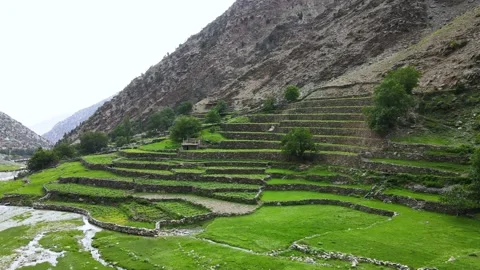 Drone flying towards terraced fields of Chilas valley, located in Pakistan. Stock Footage 237387971