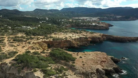 Drone flying towards the Time and Space monument, in Cala Llentia, Ibiza. Stock Footage 169042567