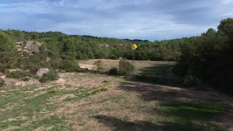 Drone Flying Towards Yellow Windmill Stock-Footage 286248097