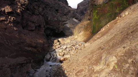 Drone Flying Trough A Deep Gorge. Canyon With Waterfall. Kamchatka Peninsula.   Stock Footage 128663664
