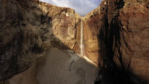 Drone Flying Trough A Deep Gorge. Canyon With Waterfall. Kamchatka Peninsula.   Stock Footage 128669450