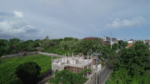 Drone flying up under construction site of house in residential area. Stock Footage 300498432