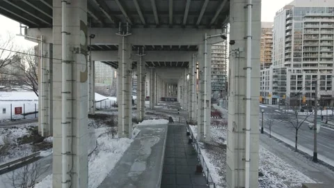 Drone flying under the Gardinner Expressway during winter Stock Footage 171954165