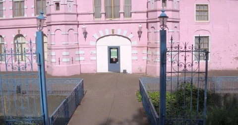 Drone flying upwards in front of a pink castle 動画素材 85223306