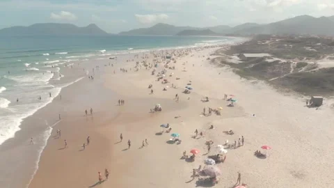 A drone flying to the water drone na praia do campeche Stock Footage