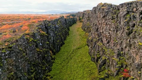 Drone flying where two tectonic plates meet in Thingvellir National Park Stock Footage 233034679