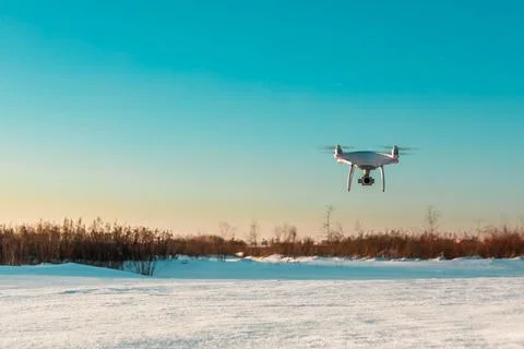 Drone flying in winter Stock Photos