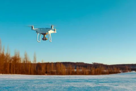 Drone flying in winter Stock Photos