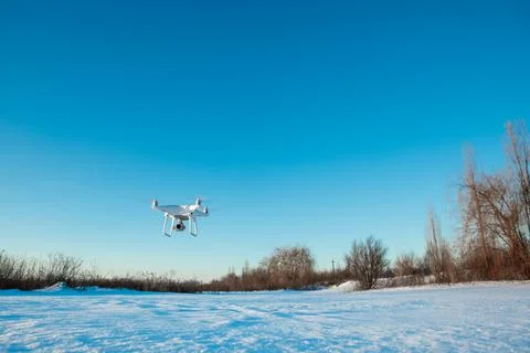 Drone flying in winter Stock Photos