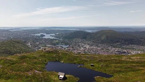 Drone flyong over mountain lake in Bergen, Norway. July 2026 Stock Footage 340080311