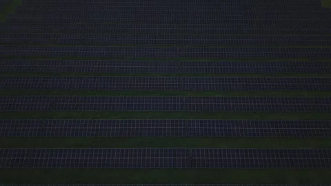 Drone flyover above large solar panel farm in countryside England Stock-Footage 334630870