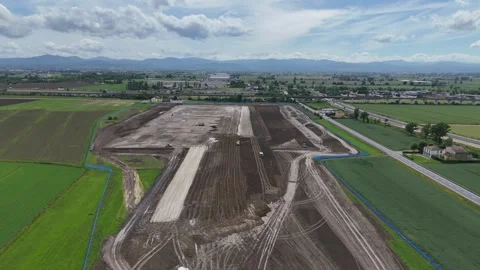 Drone flyover above logistics park construction near Fiorenzuola d'Arda Stock Footage 336256971