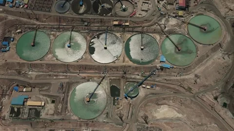 Drone Flyover Above Tailings Thickeners at Large Copper Mining Facility Stock Footage 337442360