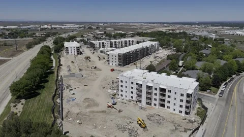 Drone flyover of apartments under construction Stock Footage 277140760