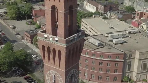 Drone flyover around brick clock tower 库存影片 304367944