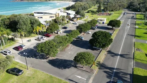 Drone flyover beach on sunny day Stock Footage 209859892