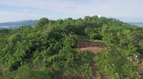 Drone Flyover Black Rock Viewpoint Looking Towards Kata and Karon in Phuket Stock-Footage 65418520