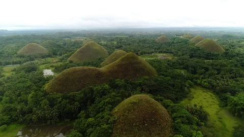 Drone flyover of the Chocolate Hills of Bohol in the Philippines Stock Footage