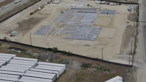 Drone flyover of construction site Stock Footage 277140471