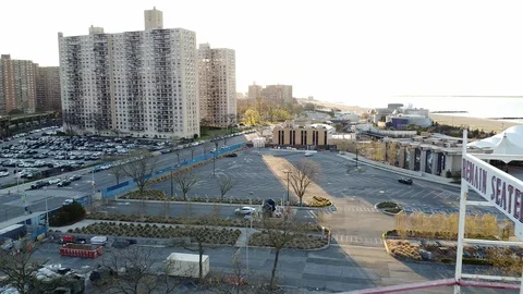 Drone flyover Cyclone Roller Coaster Coney Island Brooklyn NYC Stock Footage 129761027
