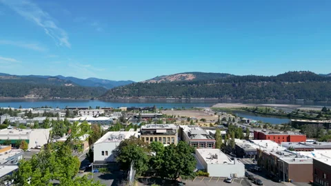 Drone Flyover Downtown Hood River, Oregon towards the water Stock Footage 248867075