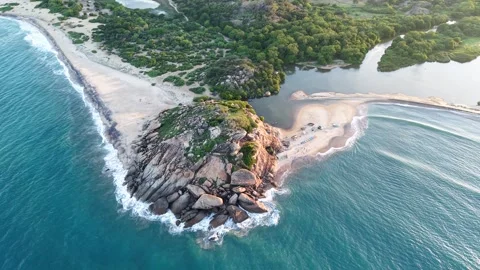 Drone Flyover of Elephant Rock and Coastal Lagoon at Sunset, Sri Lanka Stock Footage 339290956