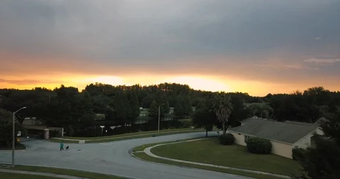 Drone Flyover of Florida Suburbs at Sunset 動画素材 97127952